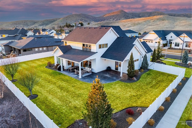 bird's eye view with a residential view and a mountain view