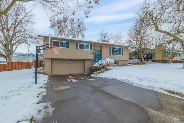 split foyer home featuring a garage