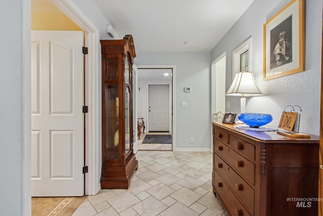 hallway with baseboards