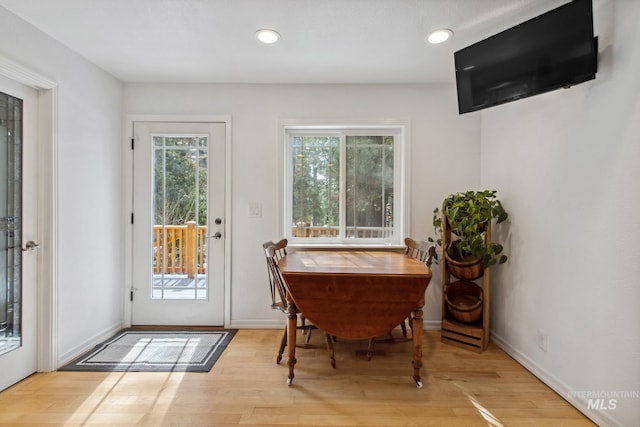 entryway featuring light wood-style floors, recessed lighting, and baseboards