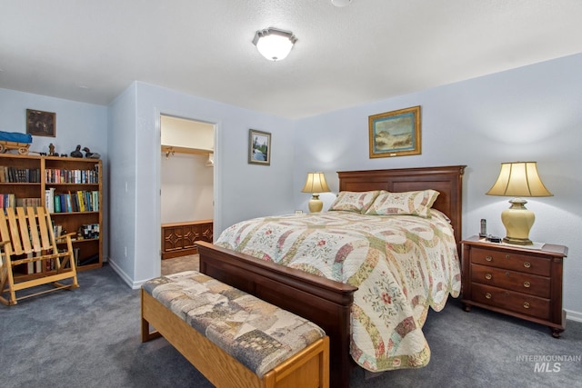 carpeted bedroom with baseboards