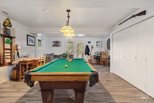 rec room featuring french doors, visible vents, billiards, and wood finished floors