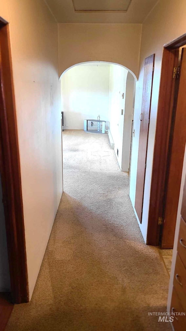 1120 N State St, Grangeville, ID 83530 - hallway with carpet floors and arched walkways
