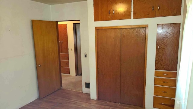 1120 N State St, Grangeville, ID 83530 - unfurnished bedroom featuring wood finished floors and a closet
