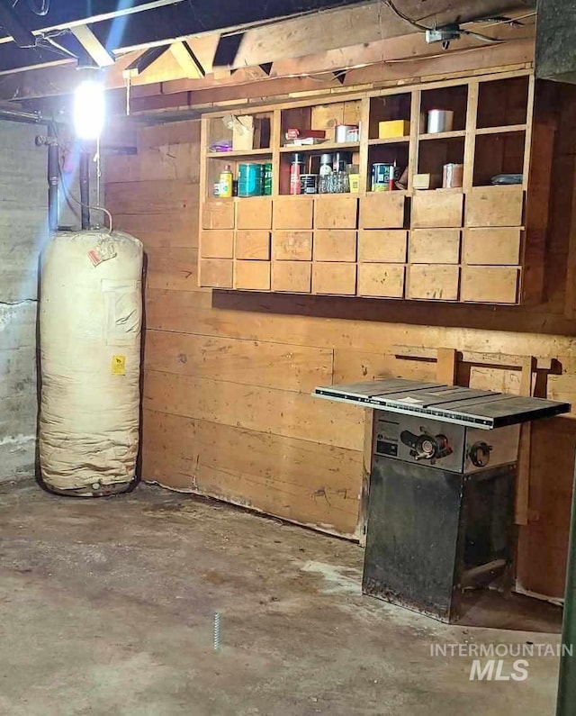 basement featuring water heater