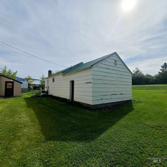 garage with a lawn