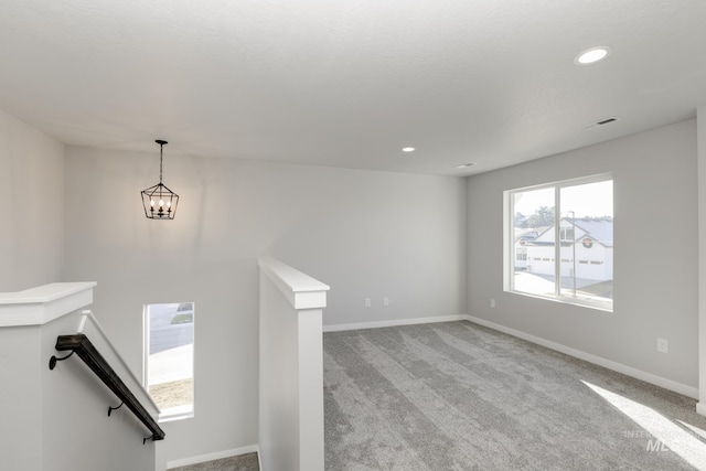 interior space featuring recessed lighting, baseboards, and carpet floors