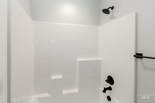 full bathroom with shower / bath combination