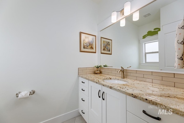 1833 N Monterossa, Eagle, ID 83616 - bathroom with tasteful backsplash, vanity, and tile patterned flooring