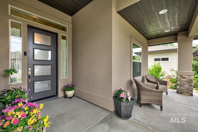 1833 N Monterossa, Eagle, ID 83616 - entrance to property with stucco siding and covered porch