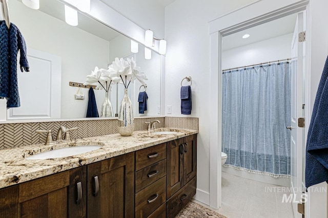 1833 N Monterossa, Eagle, ID 83616 - bathroom with toilet, backsplash, double vanity, and a shower with curtain