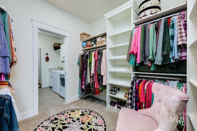 1833 N Monterossa, Eagle, ID 83616 - walk in closet with washer and clothes dryer and carpet flooring