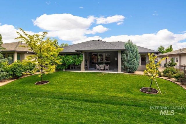 1833 N Monterossa, Eagle, ID 83616 - rear view of house with a patio area, a lawn, and roof with shingles