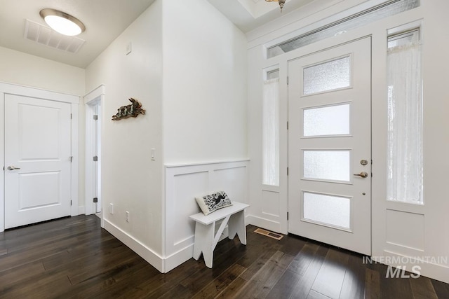 1833 N Monterossa, Eagle, ID 83616 - foyer entrance featuring dark wood-style floors and wainscoting