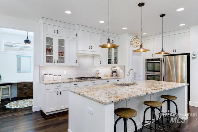 1833 N Monterossa, Eagle, ID 83616 - kitchen with a sink, appliances with stainless steel finishes, dark wood-type flooring, white cabinets, and recessed lighting