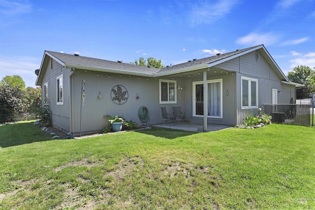 2908 E Iowa Ave, Nampa, ID 83686 - back of property featuring a patio area