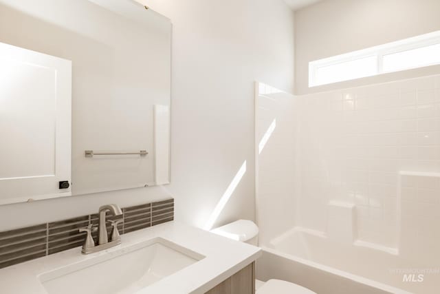 2804 N Eagle Meadow Ave, Kuna, ID 83634 - bathroom with toilet, vanity, and bathtub / shower combination