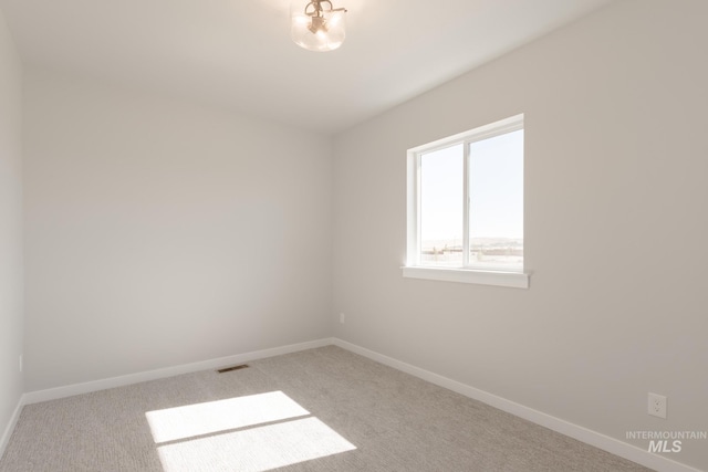 2804 N Eagle Meadow Ave, Kuna, ID 83634 - carpeted spare room with visible vents and baseboards
