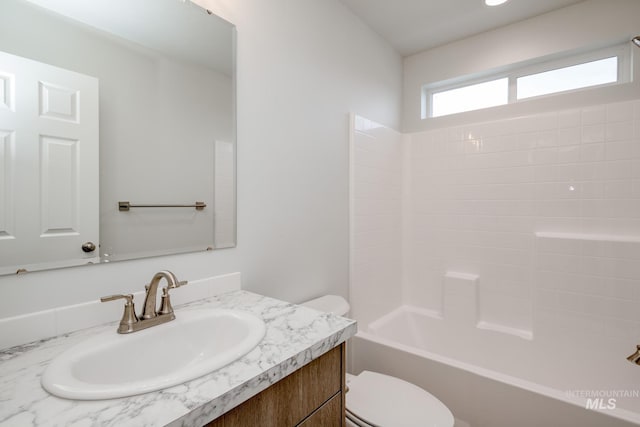 2804 N Eagle Meadow Ave, Kuna, ID 83634 - bathroom with vanity, toilet, and bathtub / shower combination