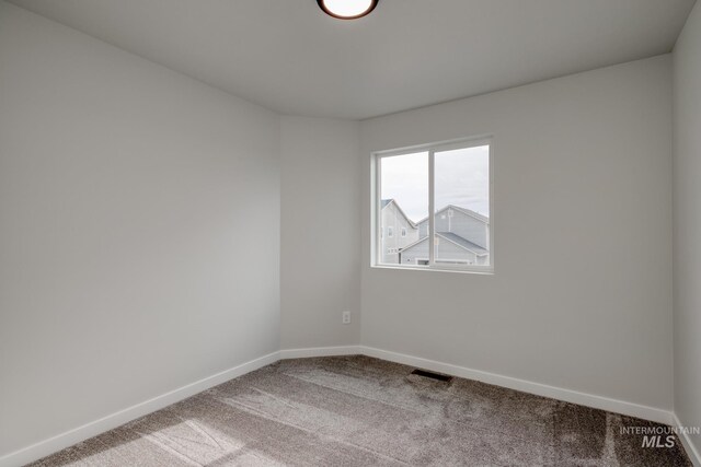 2804 N Eagle Meadow Ave, Kuna, ID 83634 - carpeted spare room with visible vents and baseboards