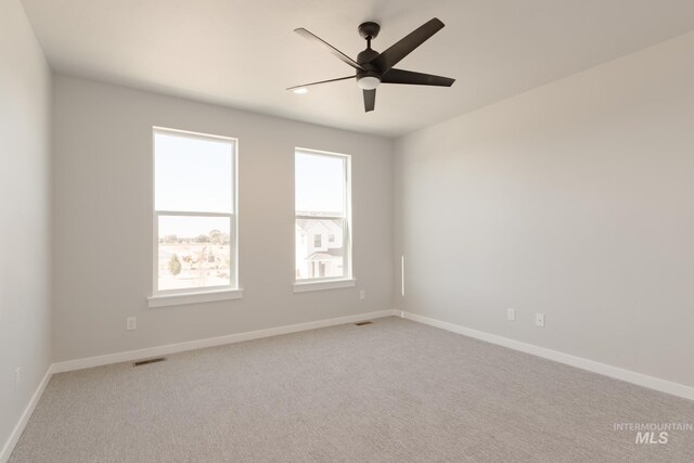 2804 N Eagle Meadow Ave, Kuna, ID 83634 - spare room with a ceiling fan, visible vents, and baseboards