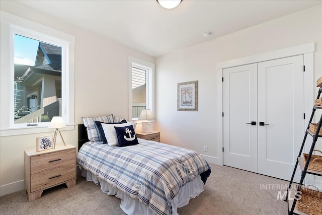 819 Cedar Point Way, Nampa, ID 83686 - bedroom with light carpet, a closet, and baseboards