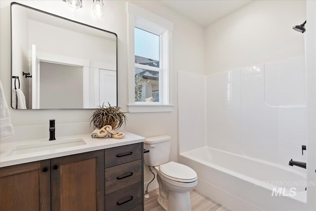 819 Cedar Point Way, Nampa, ID 83686 - full bath with toilet, vanity, wood finished floors, and washtub / shower combination
