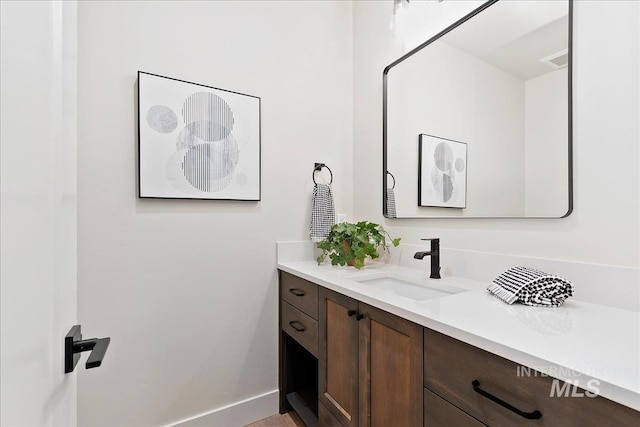 819 Cedar Point Way, Nampa, ID 83686 - bathroom featuring vanity and baseboards