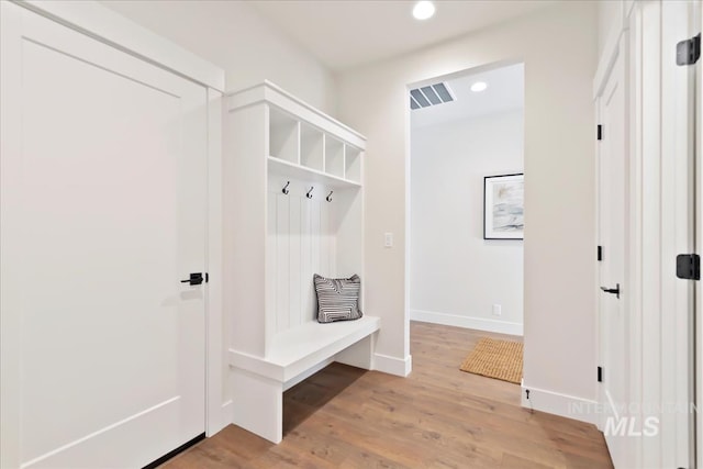 819 Cedar Point Way, Nampa, ID 83686 - mudroom with light wood-type flooring, recessed lighting, and baseboards