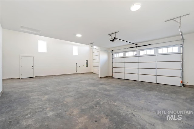 819 Cedar Point Way, Nampa, ID 83686 - garage featuring a garage door opener