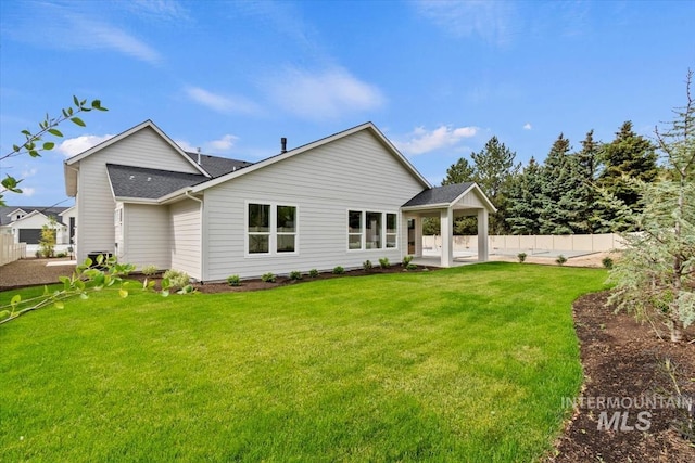 819 Cedar Point Way, Nampa, ID 83686 - back of house with roof with shingles and a patio