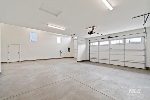 819 Cedar Point Way, Nampa, ID 83686 - garage with a garage door opener and baseboards