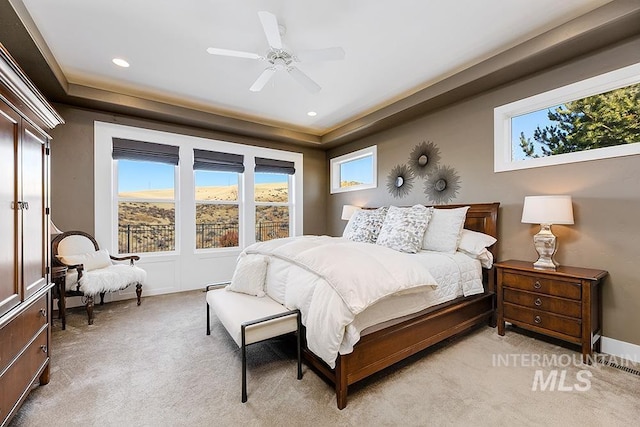 bedroom featuring light carpet, recessed lighting, a ceiling fan, and baseboards