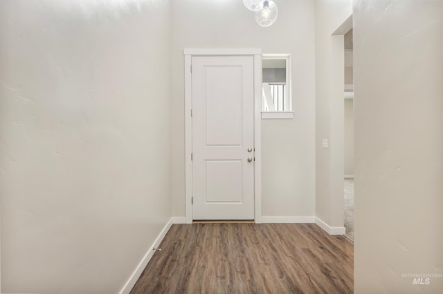 6135 N Morpheus Ave, Meridian, ID 83642 - doorway featuring wood finished floors and baseboards