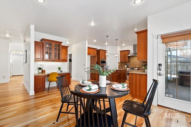 dining room featuring light hardwood / wood-style flooring