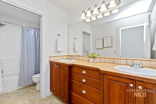 full bathroom with vanity, toilet, and shower / bathtub combination with curtain