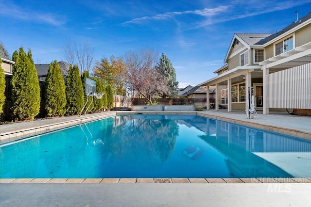 view of pool featuring a patio area