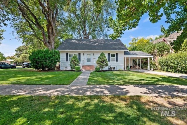 1922 Everett, Caldwell, ID 83605 - view of front facade with an attached carport, a front lawn, and driveway