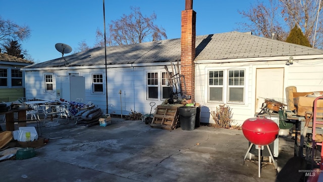 rear view of property featuring a patio