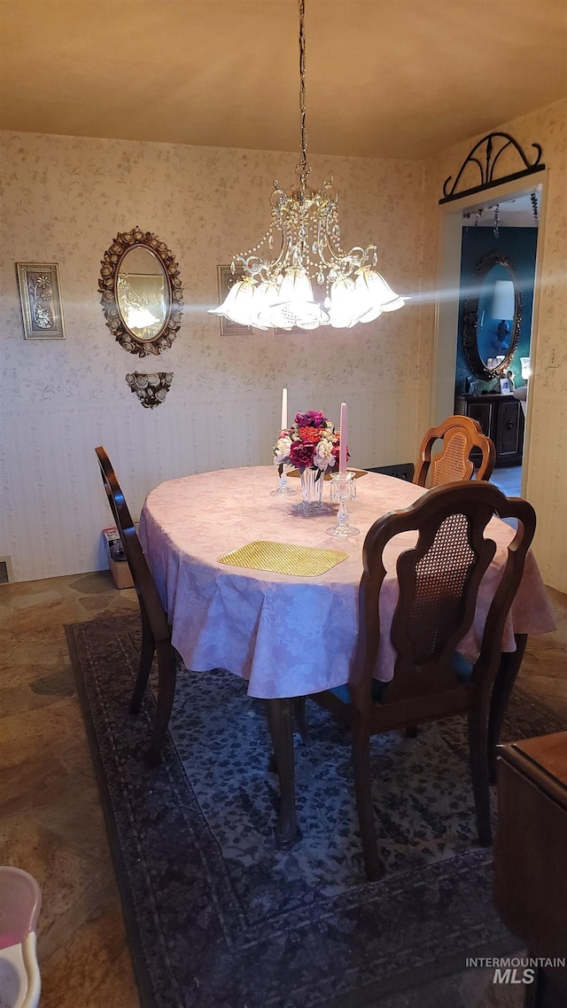 dining area with a chandelier