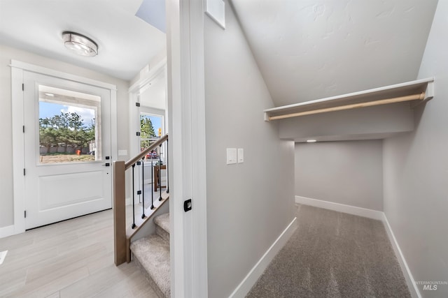 interior space featuring baseboards