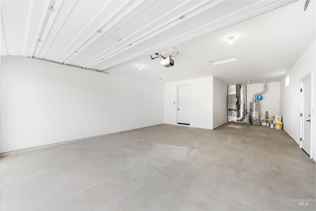 garage with a garage door opener and gas water heater