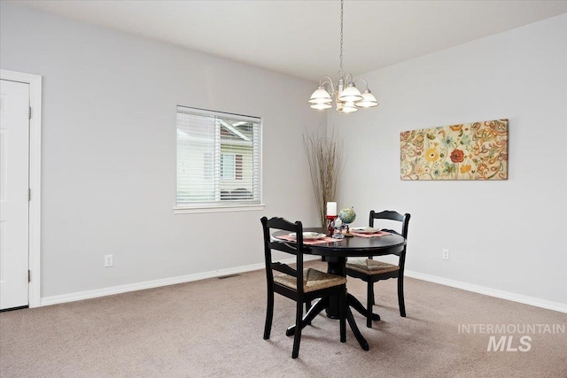 182 New Hampshire Way, Twin Falls, ID 83301 - dining space featuring a chandelier, carpet flooring, and baseboards