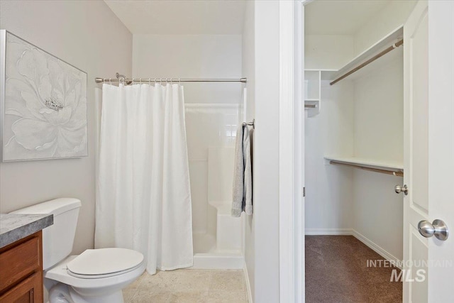 182 New Hampshire Way, Twin Falls, ID 83301 - full bath with a shower with shower curtain, toilet, vanity, baseboards, and a spacious closet