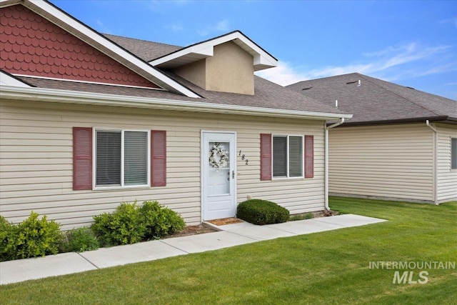182 New Hampshire Way, Twin Falls, ID 83301 - view of front of property with roof with shingles and a front yard