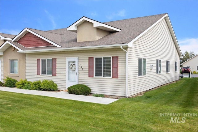 182 New Hampshire Way, Twin Falls, ID 83301 - view of front facade featuring a front yard and a shingled roof