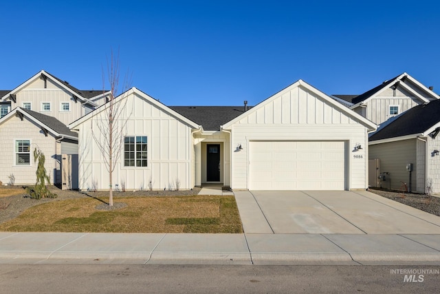 2041 W Gelding St, Middleton, ID 83644 - modern inspired farmhouse featuring board and batten siding, a garage, driveway, and a front lawn