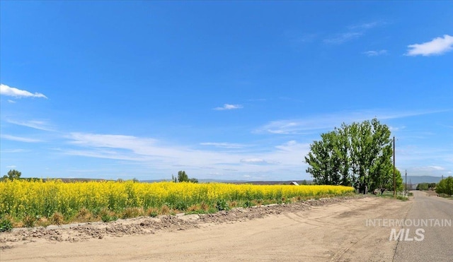 view of street featuring a rural view