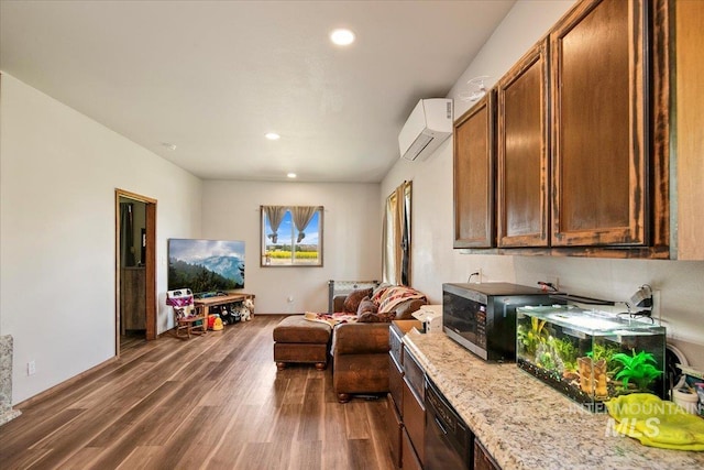 living room featuring dark wood-type flooring, baseboards, recessed lighting, and a wall unit AC
