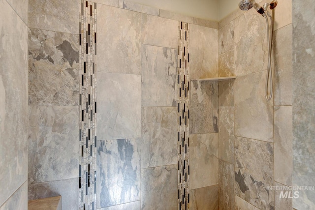 details featuring a tile shower